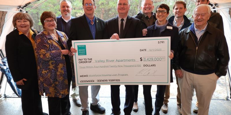 Workforce Housing Check to Be Given at Valley River Apartments in Murphy, December 1 Group of people holding up a check
