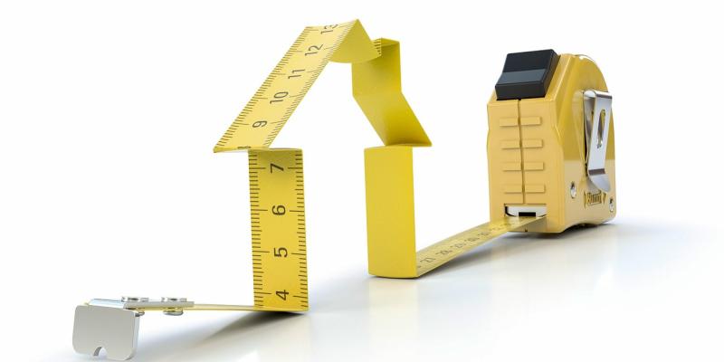 A tape measure in the shape of a house